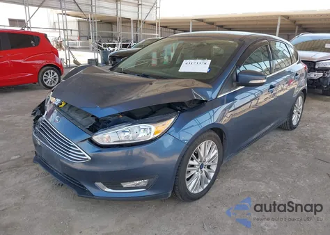 2018 Ford Focus Titanium z USA, uszkodzony, nr VIN 1FADP3N21JL230788